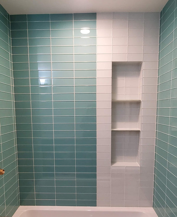 Modwalls Lush Glass Subway Tile | 3x6 in Cloud | White | Pictured installed in a shower | Colorful Modern glass tile for bathrooms, showers, kitchen, backsplashes, pools & outdoors.