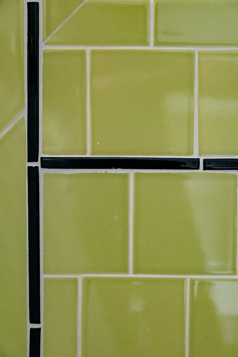 Modwalls Kiln Handmade Ceramic Tile | 4x4 in Pear Green | Colorful Modern tile for backsplashes, kitchens, bathrooms, showers & feature areas. 