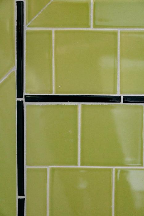 Modwalls Kiln Handmade Ceramic Tile | 4x4 in Pear Green | Colorful Modern tile for backsplashes, kitchens, bathrooms, showers & feature areas.