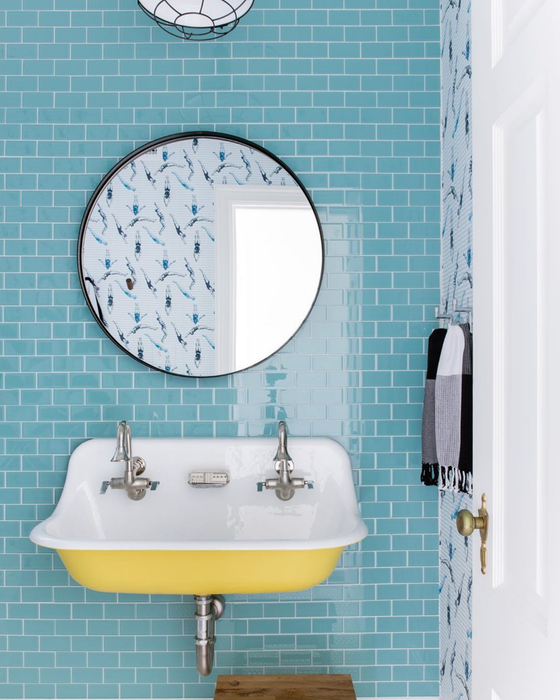 Modwalls Lush Glass Subway Tile | 3x6 in Breaker | Blue | Pictured installed in a bathroom | Colorful Modern glass tile for bathrooms, showers, kitchen, backsplashes, pools & outdoors.