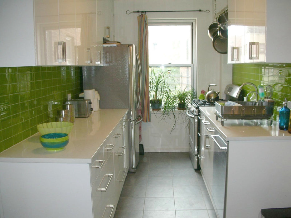 Modwalls Lush Glass Subway Tile | 3x6 in Lemongrass | Green | Pictured installed on a kitchen backsplash | Colorful Modern glass tile for bathrooms, showers, kitchen, backsplashes, pools & outdoors.