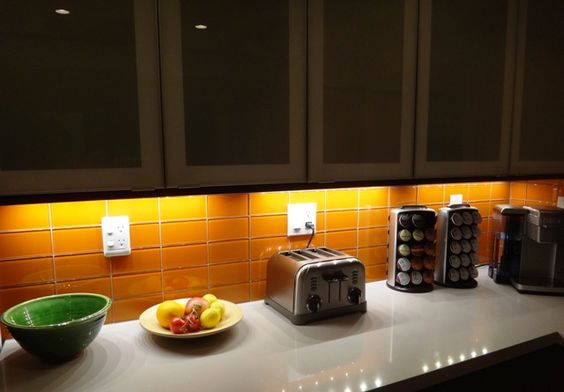 Modwalls Lush Glass Subway Tile | 3x6 in Poppy | Orange | Pictured installed on a kitchen backsplash | Colorful Modern glass tile for bathrooms, showers, kitchen, backsplashes, pools & outdoors.