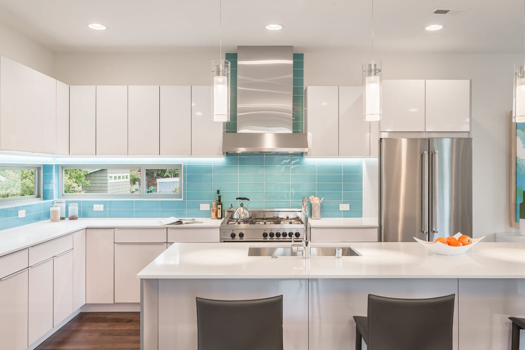 Modwalls Lush Glass Subway Tile | 4x12 in Breaker | Blue | Pictured installed on a kitchen backsplash | Colorful Modern glass tile for bathrooms, showers, kitchen, backsplashes, pools & outdoors.