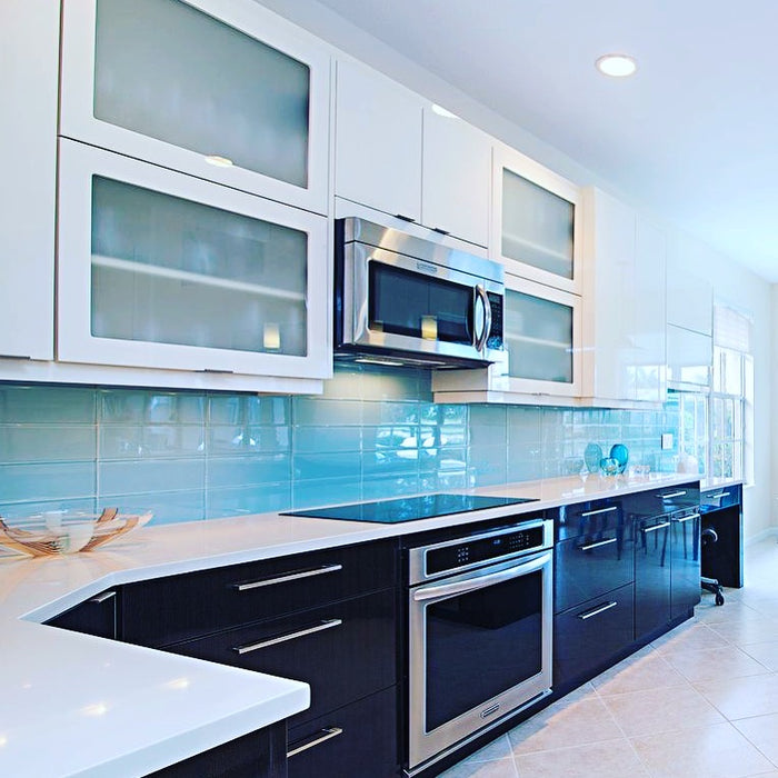 Modwalls Lush Glass Subway Tile | 4x12 in Breaker | Blue | Pictured installed on a kitchen backsplash | Colorful Modern glass tile for bathrooms, showers, kitchen, backsplashes, pools & outdoors.