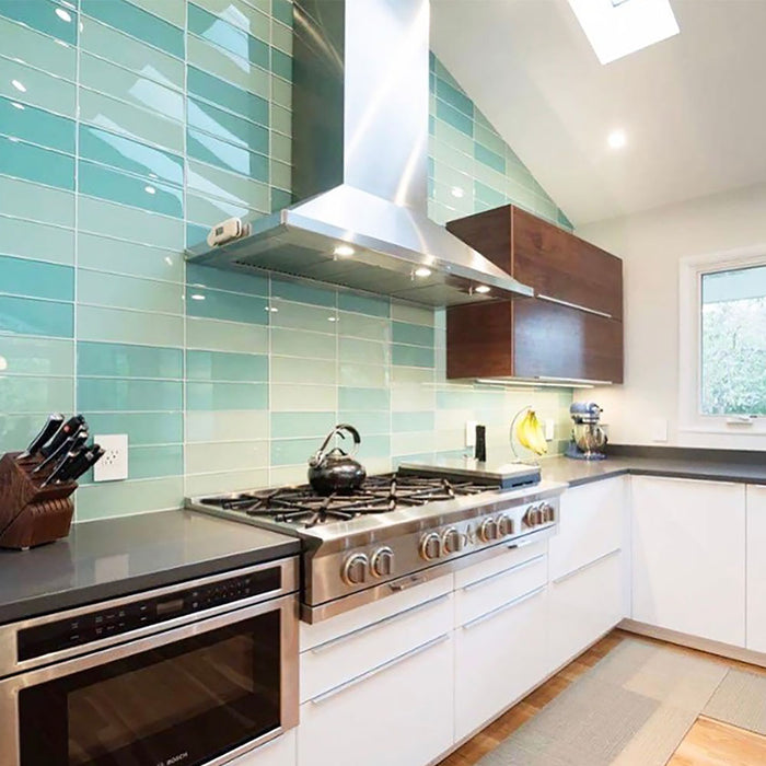 Modwalls Lush Glass Subway Tile | 4x12 in Surf | Green | Pictured on a kitchen backsplash | Colorful Modern glass tile for bathrooms, showers, kitchen, backsplashes, pools & outdoors.