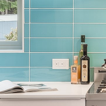 Modwalls Lush Glass Subway Tile | 4x12 in Breaker | Blue | Pictured installed on a kitchen backsplash | Colorful Modern glass tile for bathrooms, showers, kitchen, backsplashes, pools & outdoors.
