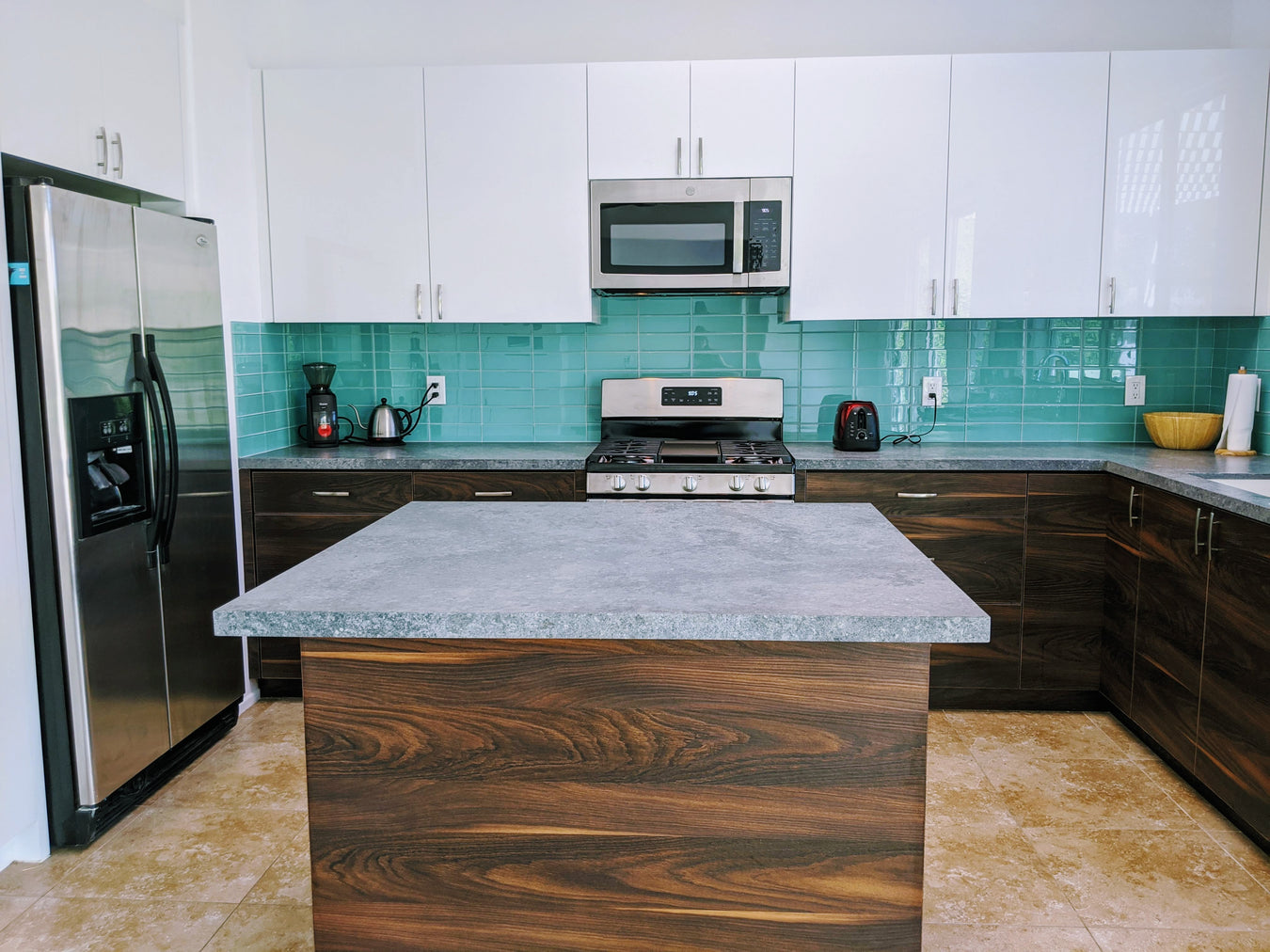 Lush glass 3x9 subway tile in Pool, which is a teal blue. Lush subway tile is a great choice for kitchen backsplashes, showers, bathrooms and outdoor and pool. Our subway tile is available in white, blue, green, yellow, orange, red, pink, teal and gray.