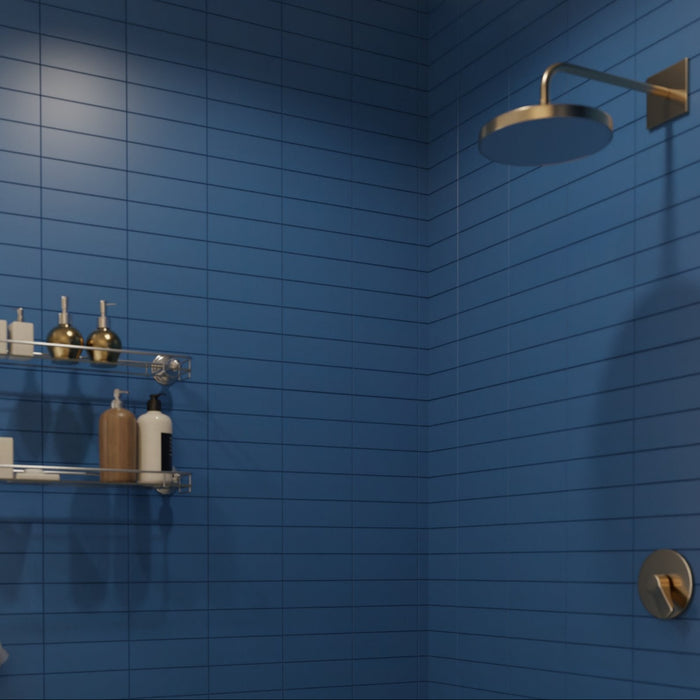 Modwalls Lush Glass Subway Tile | 3x9 in Sapphire Blue | Pictured installed in a shower | Colorful Modern glass tile for bathrooms, showers, kitchen, backsplashes, pools & outdoors.