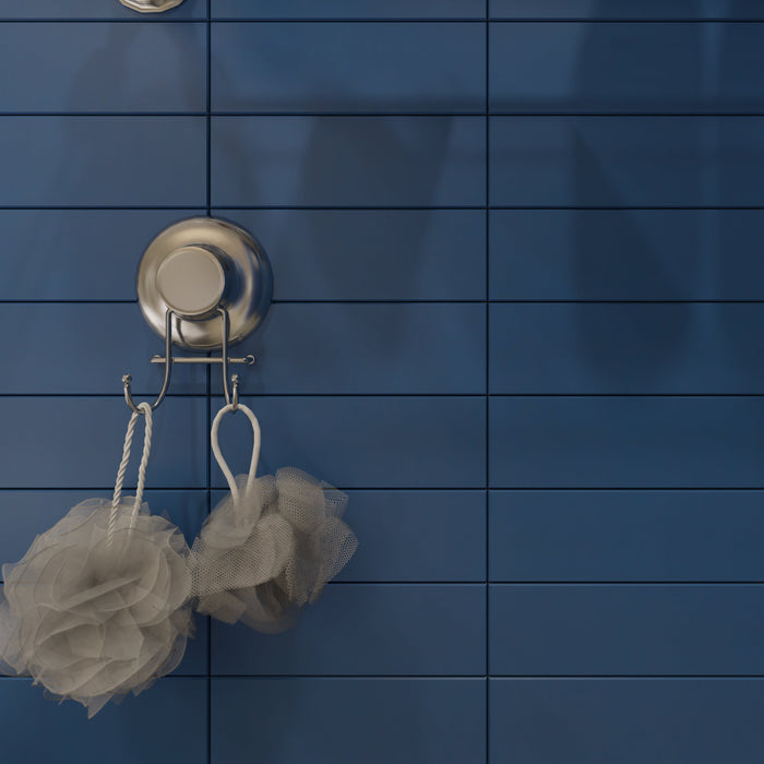Modwalls Lush Glass Subway Tile | 3x9 in Sapphire Blue | Pictured installed in a shower | Colorful Modern glass tile for bathrooms, showers, kitchen, backsplashes, pools & outdoors.