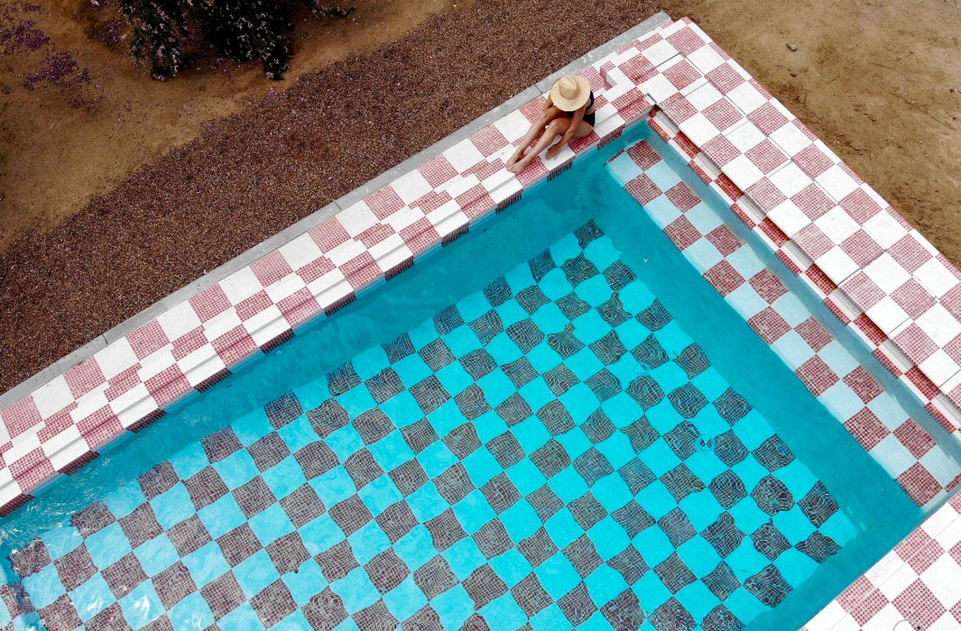 Modwalls Mediterranean Mosaic Porcelain Tile | Athens Blend Matte | White | Pictured installed in a pool in a checkerboard pattern | Colorful Modern & Midcentury tile for bathrooms, kitchens, backsplashes, showers, floors, pools & outdoors.