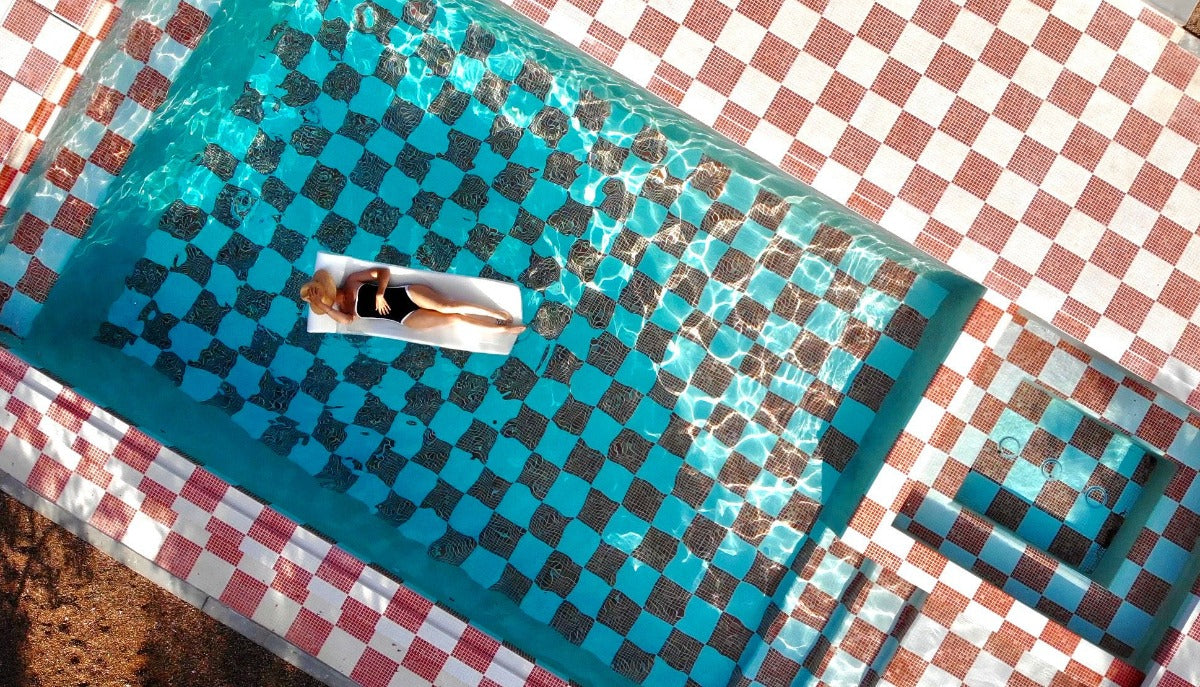Modwalls Mediterranean Mosaic Porcelain Tile | Athens Blend Matte | White | Pictured installed in a pool in a checkerboard pattern | Colorful Modern & Midcentury tile for bathrooms, kitchens, backsplashes, showers, floors, pools & outdoors.