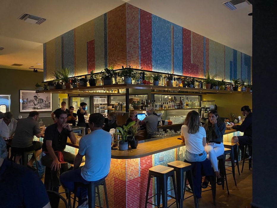 Modwalls Mediterranean Mosaic Porcelain Tile | Palermo Blend Gloss | Blue | Pictured installed in a restaurant on a bar | Colorful Modern & Midcentury tile for bathrooms, kitchens, backsplashes, showers, floors, pools & outdoors.