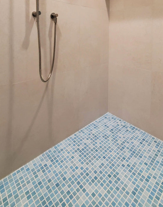 Modwalls Mediterranean Mosaic Porcelain Tile | Palermo Blend Gloss | Blue | Pictured installed on a shower floor | Colorful Modern & Midcentury tile for bathrooms, kitchens, backsplashes, showers, floors, pools & outdoors.