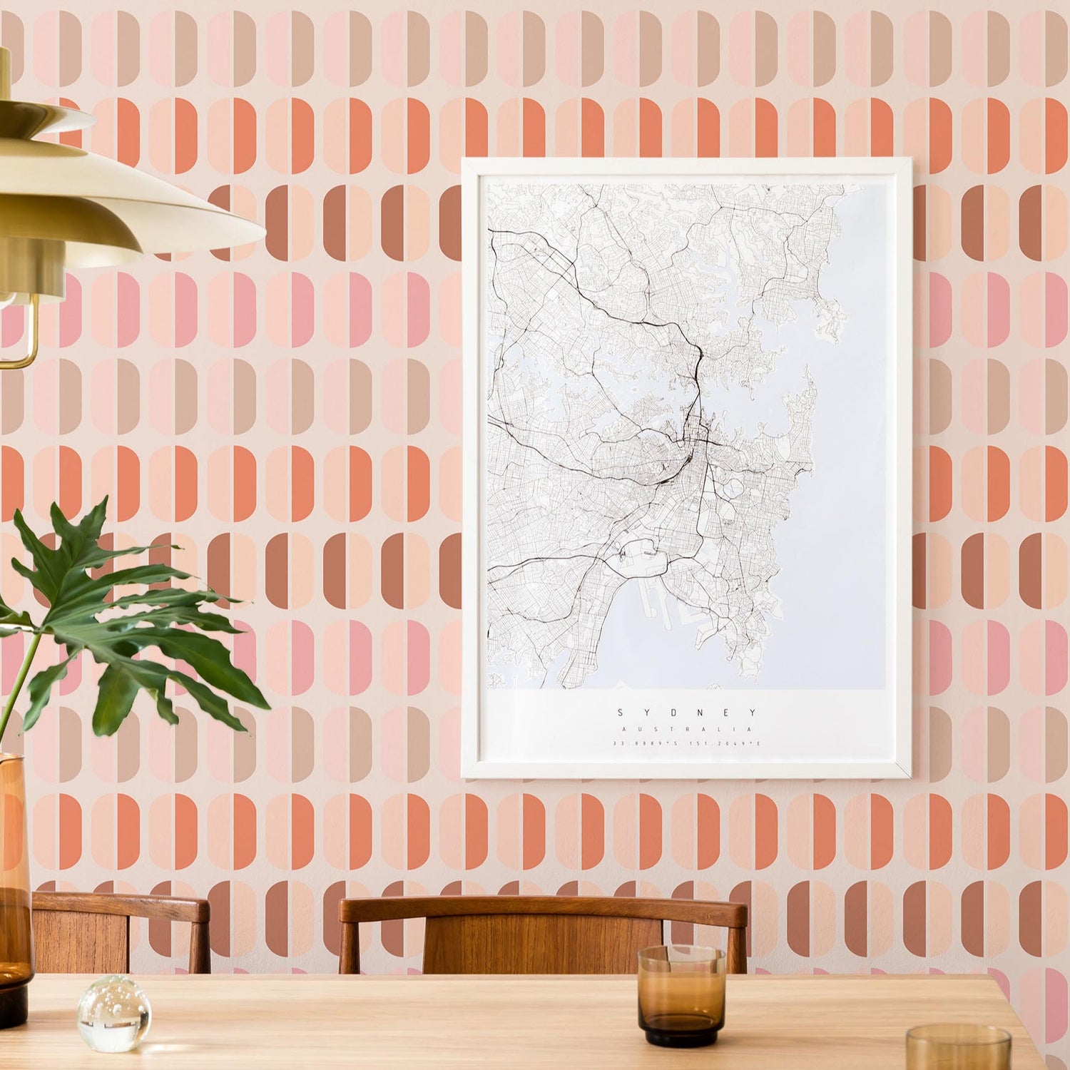 Modwalls ModPaper | ModDuo | Multicolor wallpaper with pink and red | Pictured installed in a dining room | Colorful Midcentury and Retro wallpapers for bathrooms, kitchens, living rooms, dining rooms, baby rooms, kid’s rooms, and offices.