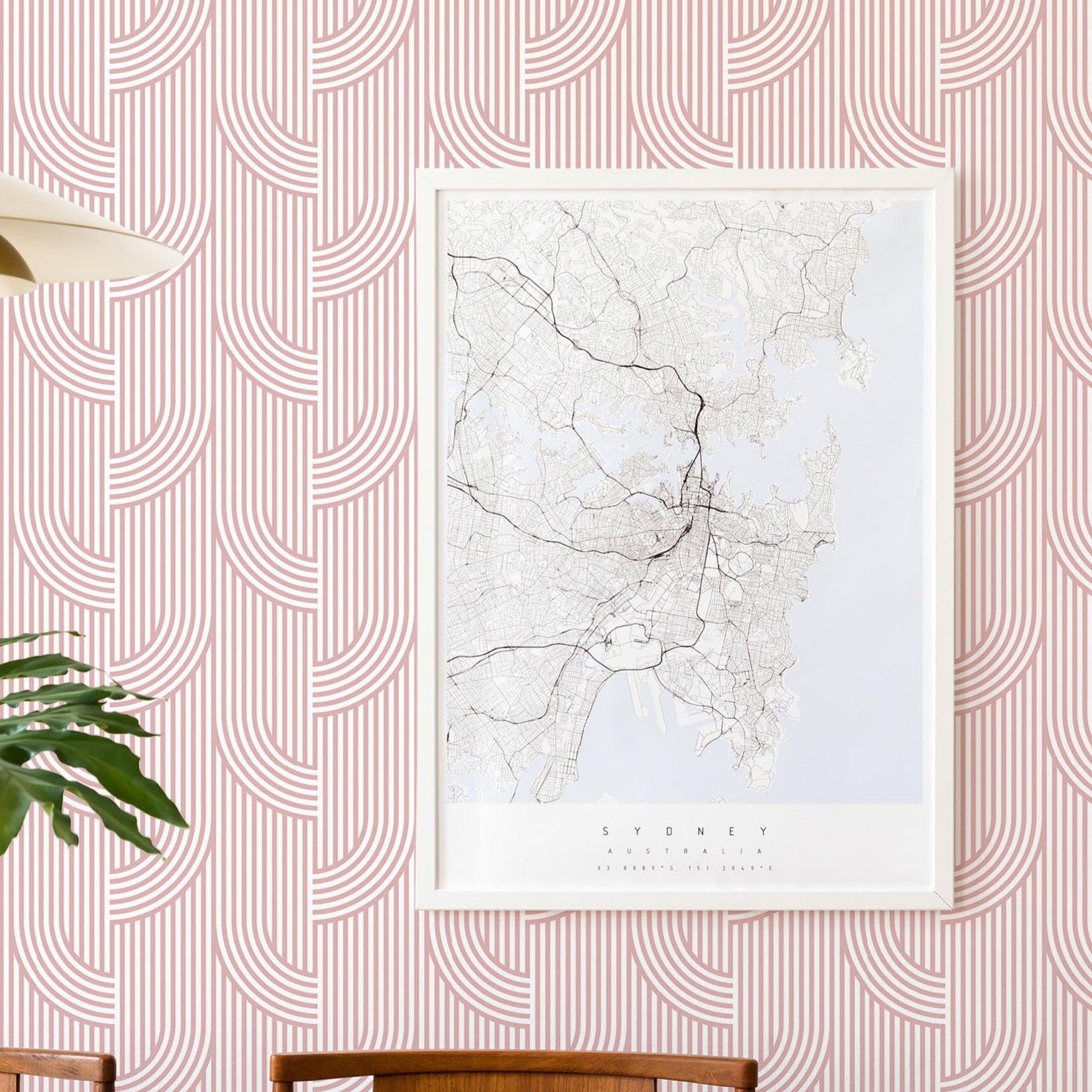 Modwalls ModPaper | ModGlide | Pink repeating wallpaper design | Pictured installed in a dining room | Colorful Midcentury and Retro wallpapers for bathrooms, kitchens, living rooms, dining rooms, baby rooms, kid’s rooms, and offices.