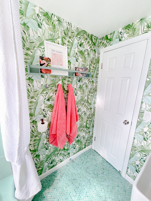 Modwalls PopDotz Porcelain Penny Round Tile | Spearmint Blend | Green | Pictured installed on a bathroom floor |  Colorful Modern & Midcentury tile for bathrooms, kitchens, backsplashes, showers, floors, pools & outdoors.