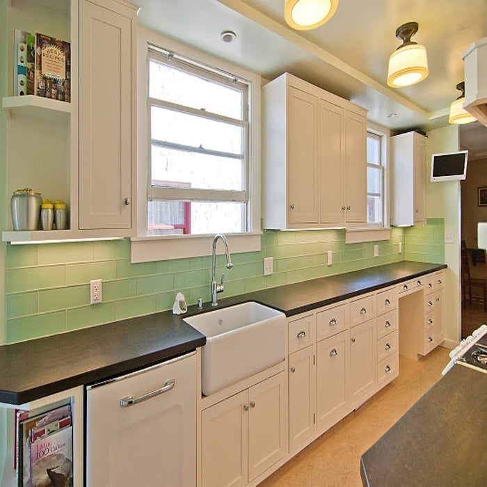 Modwalls Lush Glass Subway Tile | 4x12 in Surf | Green | Pictured on a kitchen backsplash | Colorful Modern glass tile for bathrooms, showers, kitchen, backsplashes, pools & outdoors.