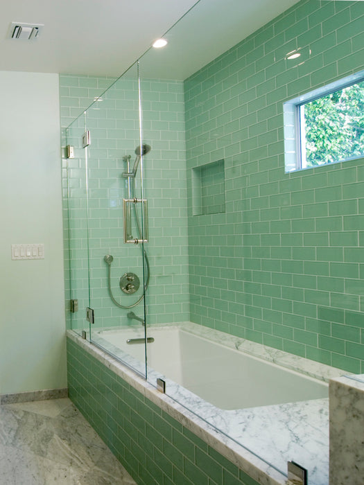 Modwalls Lush Glass Subway Tile | 3x6 in Surf | Green | Pictured installed in a shower | Colorful Modern glass tile for bathrooms, showers, kitchen, backsplashes, pools & outdoor.
