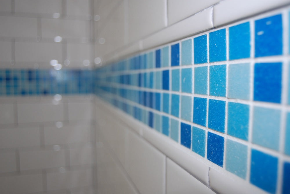 Modwalls Brio Glass Mosaic Tile | Cool Pool Blend | Pictured in a shower | Colorful Modern & Midcentury glass tile for kitchens, bathrooms, backsplashes, showers, pools & outdoors.