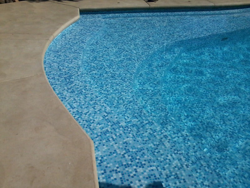 Modwalls Brio Glass Mosaic Tile | Cool Pool Blend | Pictured installed in a pool | Colorful Modern & Midcentury glass tile for kitchens, bathrooms, backsplashes, showers, pools & outdoors.