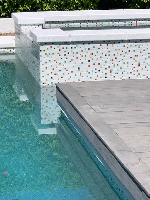 Modwalls Brio Glass Mosaic Tile | Atomic Blend | Pictured in a pool installation | Colorful Modern & Midcentury glass tile for kitchens, bathrooms, backsplashes, showers, pools & outdoors.