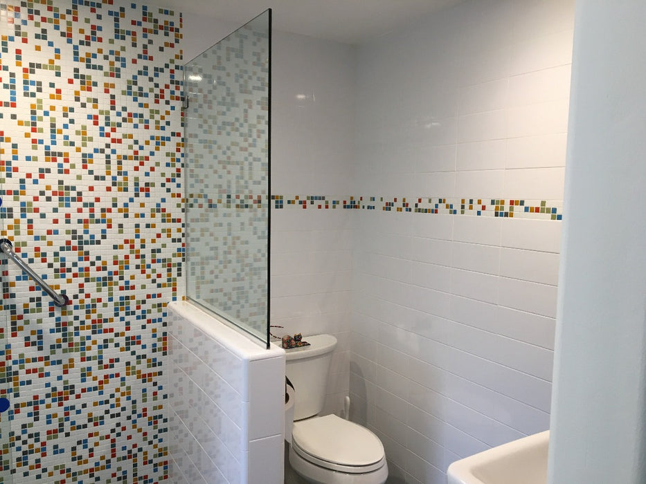 Modwalls Brio Glass Mosaic Tile | Logo Blend | Pictured in a shower | Colorful Modern & Midcentury glass tile for kitchens, bathrooms, backsplashes, showers, pools & outdoors.