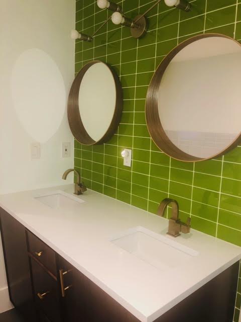 Modwalls Lush Glass Subway Tile | 3x6 in Lemongrass | Green | Pictured installed in a bathroom | Colorful Modern glass tile for bathrooms, showers, kitchen, backsplashes, pools & outdoors.
