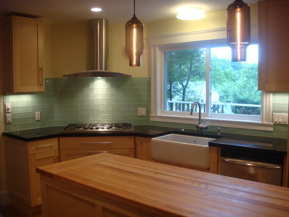 Modwalls Lush Glass Subway Tile | 3x6 in Surf | Green | Pictured installed on a kitchen backsplash | Colorful Modern glass tile for bathrooms, showers, kitchen, backsplashes, pools & outdoors.
