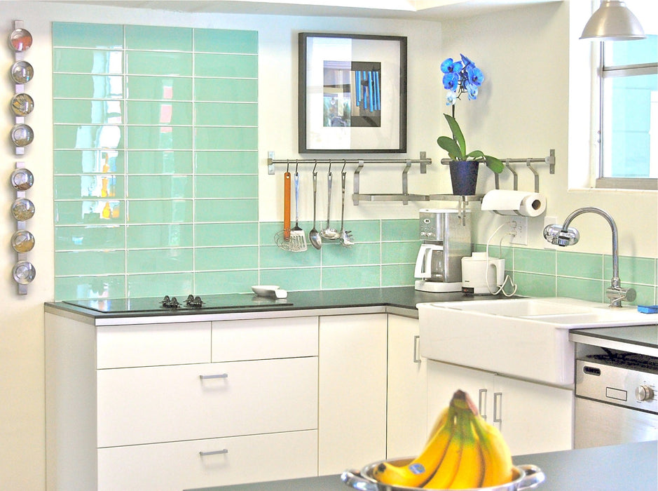 Modwalls Lush Glass Subway Tile | 4x12 in Surf | Green | Pictured on a kitchen backsplash | Colorful Modern glass tile for bathrooms, showers, kitchen, backsplashes, pools & outdoors.