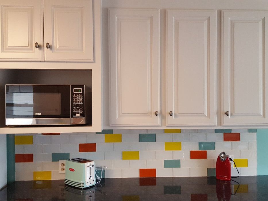Modwalls Lush Glass Subway Tile | 3x6 in Pool | Blue | Pictured installed on a kitchen backsplash | Colorful Modern glass tile for bathrooms, showers, kitchen, backsplashes, pools & outdoors.