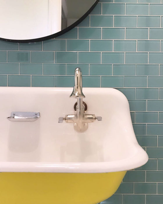 Modwalls Lush Glass Subway Tile | 3x6 in Pool | Blue | Pictured installed on a bathroom wall | Colorful Modern glass tile for bathrooms, showers, kitchen, backsplashes, pools & outdoors.