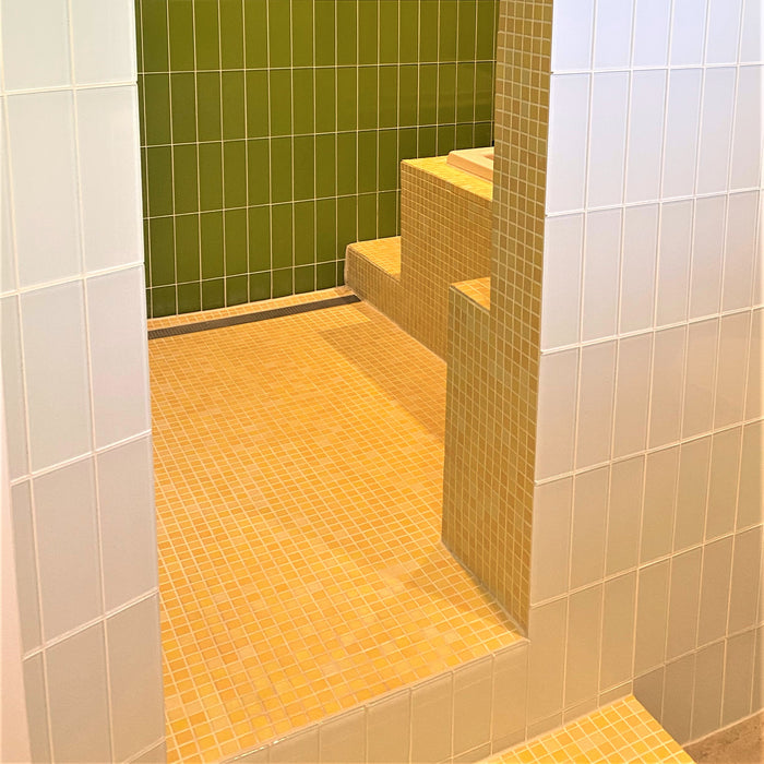 Modwalls Mediterranean Mosaic Porcelain Tile | Tangier Blend Matte | Yellow | Pictured installed in a bathtub surround | Colorful Modern & Midcentury tile for bathrooms, kitchens, backsplashes, showers, floors, pools & outdoors.