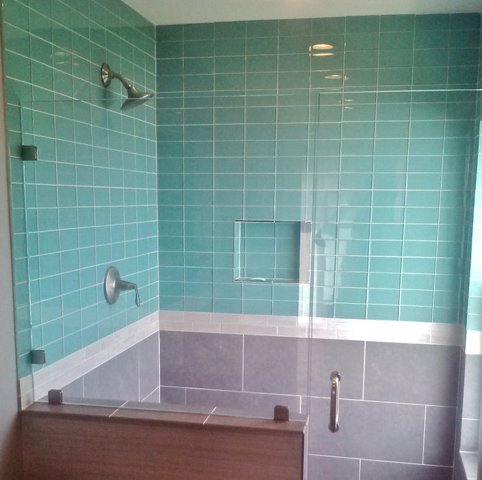 Modwalls Lush Glass Subway Tile | 3x6 in Pool | Blue | Pictured installed in a shower | Colorful Modern glass tile for bathrooms, showers, kitchen, backsplashes, pools & outdoors.