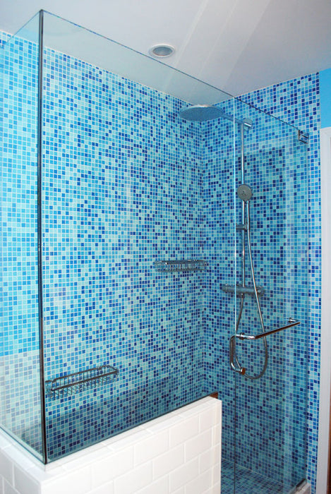 Modwalls Brio Glass Mosaic Tile | Cool Pool Blend | Pictured in a shower | Colorful Modern & Midcentury glass tile for kitchens, bathrooms, backsplashes, showers, pools & outdoors.