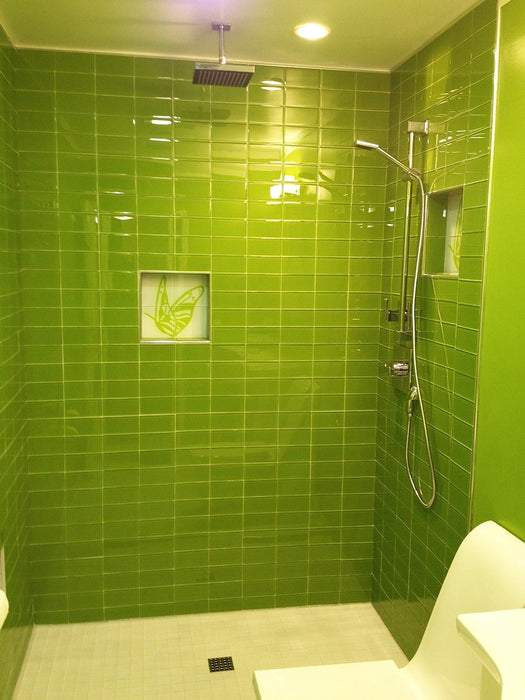 Modwalls Lush Glass Subway Tile | 3x6 in Lemongrass | Green | Pictured installed in a shower | Colorful Modern glass tile for bathrooms, showers, kitchen, backsplashes, pools & outdoors.