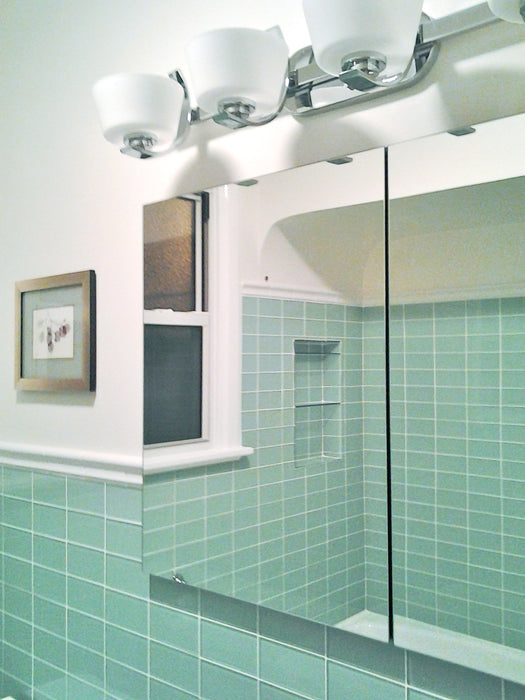 Modwalls Lush Glass Subway Tile | 3x6 in Surf | Green | Pictured installed in a bathroom | Colorful Modern glass tile for bathrooms, showers, kitchen, backsplashes, pools & outdoors.