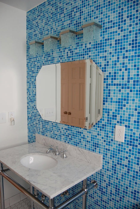 Modwalls Brio Glass Mosaic Tile | Cool Pool Blend | Pictured in a bathroom installation | Colorful Modern & Midcentury glass tile for kitchens, bathrooms, backsplashes, showers, pools & outdoors.