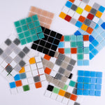 Free Brio Glass Mosaic Tile Samples. Colors include black, blue, green, gray, yellow, red, orange, white and pink. Custom designs available. 