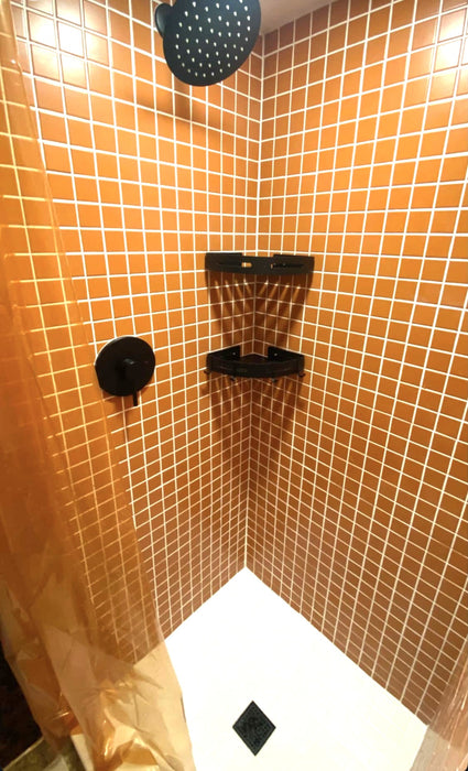 Modwalls ColorBlock 2 Porcelain Tile | Marmalade | Orange | Pictured on the walls of a shower | Colorful Modern & Midcentury tile for bathrooms, kitchens, backsplashes, showers, floors, pools & outdoors. 