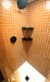 Modwalls ColorBlock 2 Porcelain Tile | Marmalade | Orange | Pictured on the walls of a shower | Colorful Modern & Midcentury tile for bathrooms, kitchens, backsplashes, showers, floors, pools & outdoors. 