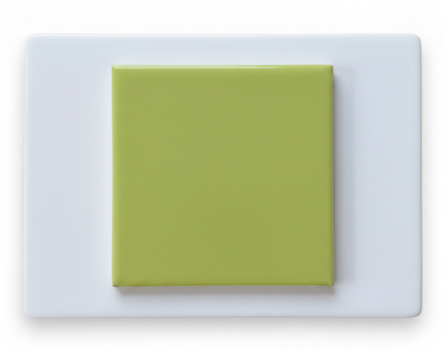 Modwalls Element Porcelain Tile Sample | Kiwi | Pictured mounted on white board | 4x4 gloss | Colorful modern tile suitable for indoor, outdoor, floor, wall, wet or dry. This tile is perfect for backsplashes, kitchens, bathrooms, showers, feature areas and commercial projects.