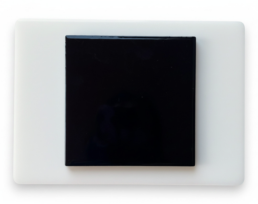 Modwalls Element Porcelain Tile Sample | Midnight Black |Pictured mounted on white board | 4x4 gloss | Colorful modern tile suitable for indoor, outdoor, floor, wall, wet or dry. This tile is perfect for backsplashes, kitchens, bathrooms, showers, feature areas and commercial projects.