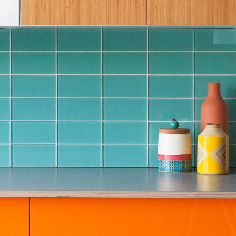 Lush glass subway tile is a stylish modern tile choice for kitchen backsplashes, bathrooms, showers and pools. Colors include blue, green, yellow, teal, orange, red, gray, black and white. Sizes include 1x4, 3x6, 3x9, 4x4 and 4x12.
