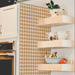 Modwalls ModPaper | ModBlossom | Brown and white | Pictured installed in a kitchen | Colorful Midcentury and Retro wallpapers for bathrooms, kitchens, living rooms, dining rooms, baby rooms, kid’s rooms, and offices. 
