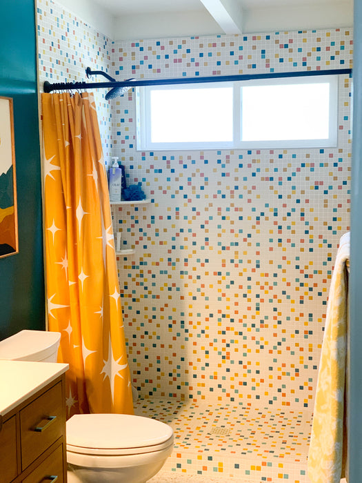 Modwalls Vita Mosaic Porcelain Tile in MCM Blend | Midcentury modern style white, orange, blue and red mosaic tiles | Pictured installed in a shower | Colorful Midcentury and Modern tile for backsplashes, kitchens, bathrooms, showers, floors, outdoor & feature areas. 