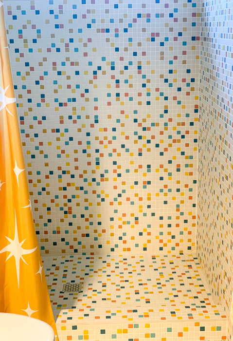 Modwalls Vita Mosaic Porcelain Tile in MCM Blend | Midcentury modern style white, orange, blue and red mosaic tiles | Pictured installed in a shower | Colorful Midcentury and Modern tile for backsplashes, kitchens, bathrooms, showers, floors, outdoor & feature areas. 