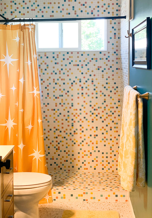 Modwalls Vita Mosaic Porcelain Tile in MCM Blend | Midcentury modern style white, orange, blue and red mosaic tiles | Pictured installed in a shower | Colorful Midcentury and Modern tile for backsplashes, kitchens, bathrooms, showers, floors, outdoor & feature areas. 