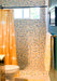 Modwalls Vita Mosaic Porcelain Tile in MCM Blend | Midcentury modern style white, orange, blue and red mosaic tiles | Pictured installed in a shower | Colorful Midcentury and Modern tile for backsplashes, kitchens, bathrooms, showers, floors, outdoor & feature areas. 