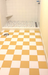ColorBlock 8 Porcelain Tile Warm Sand | Pictured as a checkerboard bathroom floor with Salt 